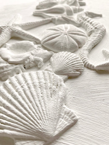 The Sea Shells 6×10 Decor Mould™ is your new DIY best friend! These food safe moulds allow you to add moulding to baked goods, furniture, decor, even your walls! Pair with the IOD Air Dry Clay for your furniture and decor, or try your own medium. Be sure to tag us in your creation so we can see how you IODo it 😉